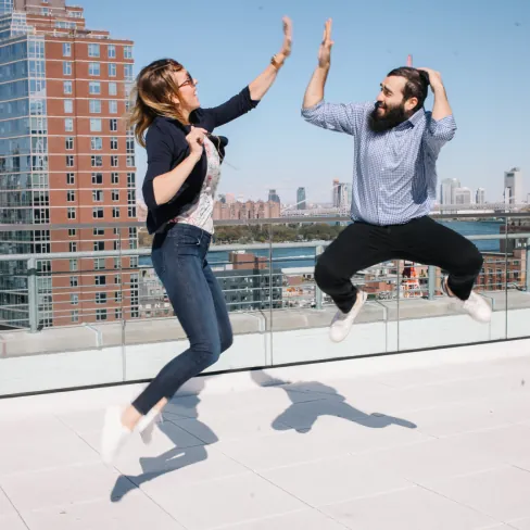 tami joe jumping high five